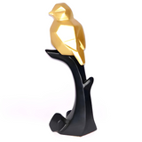 Gold sparrow on tree decoration piece